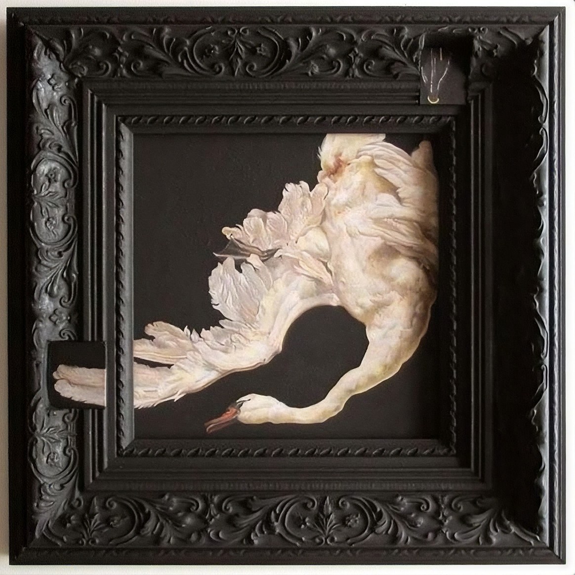 A white swan breaking out of an ornate black frame
